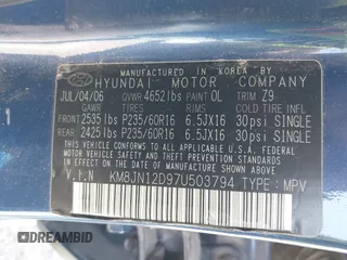 2007 Hyundai Tucson SE with VIN KM8JN12D97U503794, listed as a IAAI auction lot 41810035 with 136,321 mi miles. Bid and sale history available at carsss.com. Image 8.