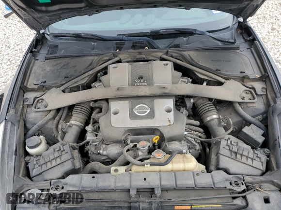 2014 Nissan 370Z Touring with VIN JN1AZ4FH1EM620177, listed as a Copart auction lot 42581255 with 106,957 mi miles and Salvage Title. Bid and sale history available at DreamBid. Image 11.