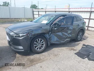 2019 Mazda CX-9 Sport with VIN JM3TCABY0K0327361, listed as a IAAI auction lot 42362232 with 264,699 mi miles and . Bid and sale history available at DreamBid. Image 17.