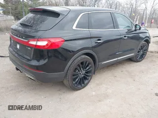 2016 Lincoln MKX Reserve with VIN 2LMTJ8LP0GBL31400, listed as a IAAI auction lot 42073406 with 136,551 mi miles. Bid and sale history available at carsss.com. Image 4.