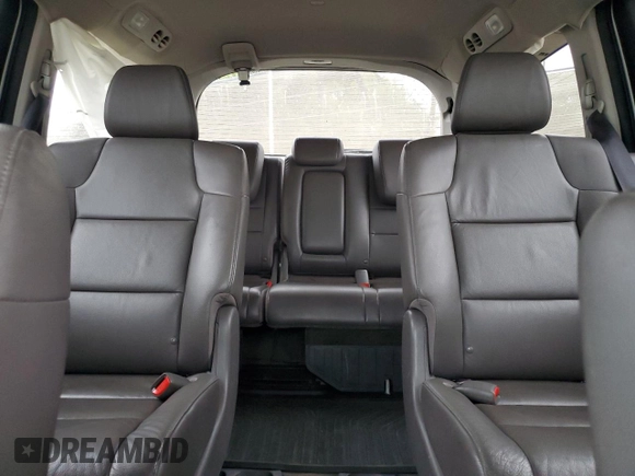 2014 Honda Odyssey Touring z VIN 5FNRL5H91EB089813, wystawiony jako Copart lot #58674275 z przebiegiem Nie podano mil oraz Szkoda całkowita • Salvage title. Historia ofert i sprzedaży dostępna na DreamBid. Obrazek 10.