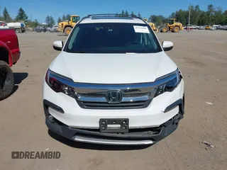 2020 Honda Pilot EX-L z VIN 5FNYF6H56LB010316, wystawiony jako IAAI lot #42433400 z przebiegiem 48 764 mil mil oraz . Historia ofert i sprzedaży dostępna na DreamBid. Obrazek 12.