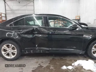 2015 Ford Taurus SEL with VIN 1FAHP2E81FG181897, listed as a IAAI auction lot 41598004 with Not Provided miles and . Bid and sale history available at carsss.com. Image 14.