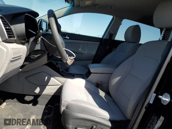 2019 Hyundai Tucson Value with VIN KM8J33A43KU888877, listed as a Copart auction lot 52191305 with 77,204 mi miles and Salvage title. Bid and sale history available at DreamBid. Image 7.