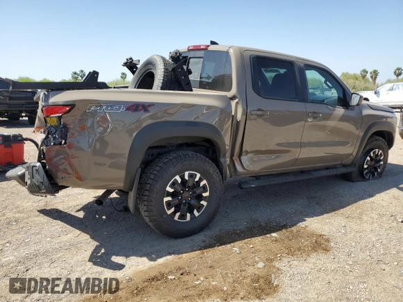 2024 Nissan Frontier Pro-4X with VIN 1N6ED1EK2RN656658, listed as a Copart auction lot 48798475 with 45 mi miles and Salvage title. Bid and sale history available at DreamBid. Image 3.