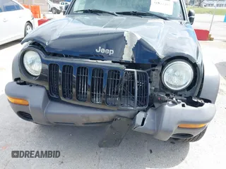 2003 Jeep Liberty Sport with VIN 1J4GL48KX3W530569, listed as a IAAI auction lot 41857397 with 172,303 mi miles. Bid and sale history available at carsss.com. Image 6.