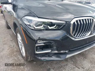 2020 BMW X5 xDrive40i with VIN 5UXCR6C04L9D63551, listed as a IAAI auction lot 42505561 with 56,763 mi miles and . Bid and sale history available at DreamBid. Image 6.