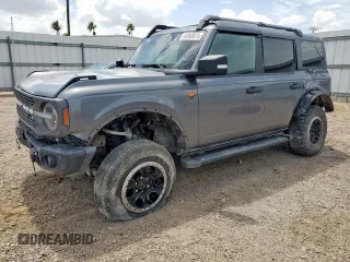 2023 Ford Bronco с VIN 1FMEE5DH1PLB80999, выставлен на аукционе Copart как лот 64993015 с пробегом 36 436 миль миль и Списание • Salvage title. История ставок и продаж доступна на DreamBid. Изображение 1.