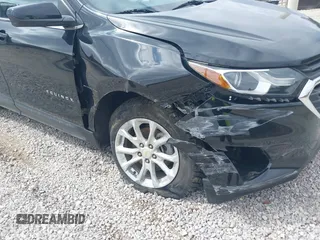 2019 Chevrolet Equinox LT with VIN 2GNAXUEV0K6286221, listed as a IAAI auction lot 41850709 with 124,363 mi miles and . Bid and sale history available at carsss.com. Image 6.