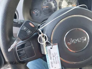 2014 Jeep Compass Sport with VIN 1C4NJCBA6ED620698, listed as a IAAI auction lot 41852056 with 193,085 mi miles and . Bid and sale history available at DreamBid. Image 11.