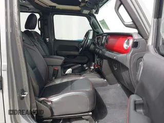 2020 Jeep Wrangler Unlimited Rubicon z VIN 1C4HJXFG2LW267154, wystawiony jako IAAI lot #41745497 z przebiegiem 28 692 mil mil oraz . Historia ofert i sprzedaży dostępna na DreamBid. Obrazek 5.