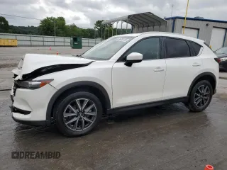 2018 Mazda CX-5 Touring z VIN JM3KFBCM4J1365687, wystawiony jako Copart lot #58636125 z przebiegiem 118 517 mil mil oraz Szkoda całkowita • Salvage title. Historia ofert i sprzedaży dostępna na DreamBid. Obrazek 1.