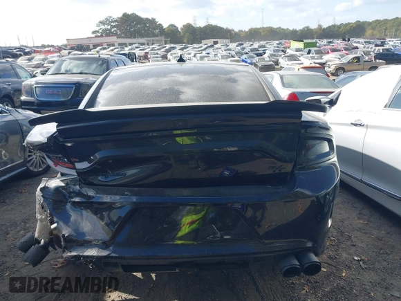 2021 Dodge Charger R/T with VIN 2C3CDXCT1MH574807, listed as a IAAI auction lot 40715181 with 51,620 mi miles and . Bid and sale history available at carsss.com. Image 16.