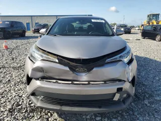 2018 Toyota C-HR XLE z VIN JTNKHMBX5J1000814, wystawiony jako Copart lot #57891045 z przebiegiem 80 466 mil mil oraz Szkody całkowita. Historia ofert i sprzedaży dostępna na DreamBid. Obrazek 5.