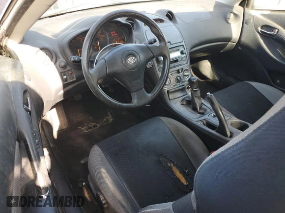 2003 Toyota Celica GT with VIN JTDDR32T330162046, listed as a Copart auction lot 57038905 with 119,768 mi miles and Salvage title. Bid and sale history available at DreamBid. Image 8.