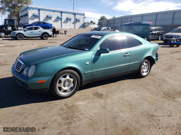 1999 Mercedes-Benz CLK-Class with VIN WDBLJ65G4XF071095, listed as a Copart auction lot 72080064 with 97,558 mi miles and Salvage Title. Bid and sale history available at carsss.com. Image 1.