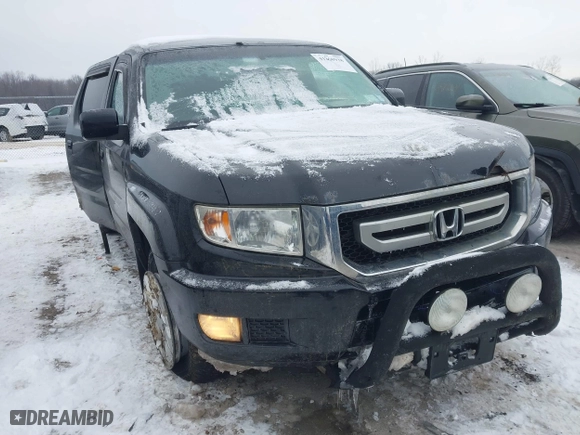 2011 Honda Ridgeline RTS with VIN 5FPYK1F48BB005889, listed as a IAAI auction lot 41268938 with 146,974 mi miles. Bid and sale history available at carsss.com. Image 1.