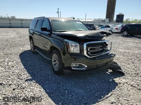 2015 GMC Yukon SLT z VIN 1GKS1BKC2FR244797, wystawiony jako Copart lot #49465995 z przebiegiem 242 448 mil mil oraz Szkoda całkowita • Salvage title. Historia ofert i sprzedaży dostępna na DreamBid. Obrazek 11.