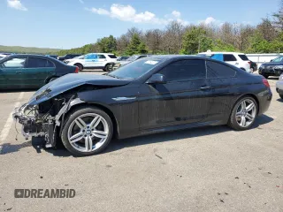 2015 BMW 6 Series z VIN WBALY1C57FDZ73541, wystawiony jako Copart lot #57294034 z przebiegiem 136 357 mil mil oraz Czysty tytuł • Clean title. Historia ofert i sprzedaży dostępna na DreamBid. Obrazek 1.
