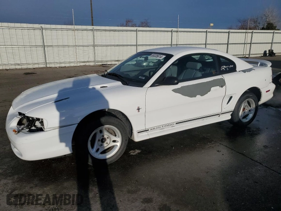 1997 Ford Mustang with VIN 1FALP4045VF120213, listed as a Copart auction lot 85335614 with 71,225 mi miles and Salvage Title. Bid and sale history available at carsss.com. Image 1.