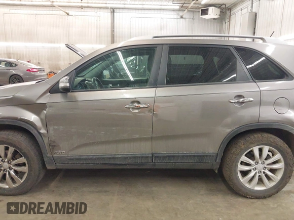 2011 Kia Sorento LX with VIN 5XYKTDA2XBG119730, listed as a IAAI auction lot 41754502 with 176,034 mi miles. Bid and sale history available at carsss.com. Image 14.