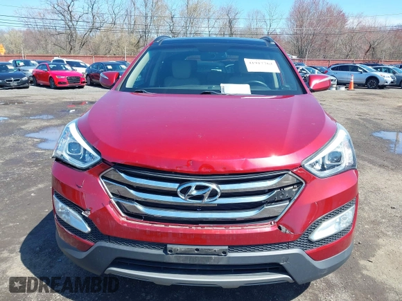 2014 Hyundai Santa Fe z VIN 5XYZUDLB3EG226857, wystawiony jako IAAI lot #41917762 z przebiegiem 42 677 mil mil oraz . Historia ofert i sprzedaży dostępna na DreamBid. Obrazek 12.