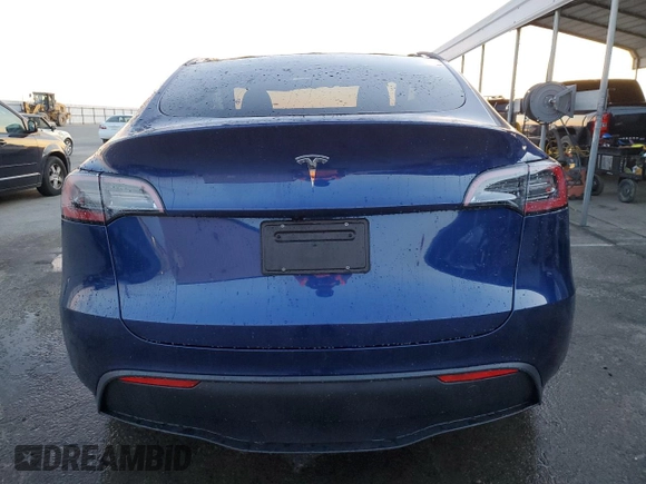 2025 Tesla Model Y Long Range with VIN 7SAYGDEDXSF232808, listed as a Copart auction lot 85647524 with 183 mi miles and Salvage Title. Bid and sale history available at DreamBid. Image 6.