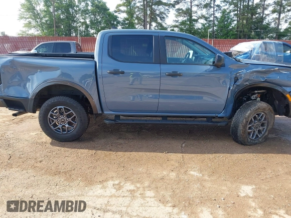 2024 Ford Ranger XLT z VIN 1FTER4GH0RLE15572, wystawiony jako IAAI lot #42138297 z przebiegiem 6 624 mil mil oraz . Historia ofert i sprzedaży dostępna na DreamBid. Obrazek 14.