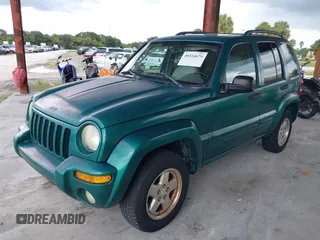 2004 Jeep Liberty Limited with VIN 1J4GK58K94W104382, listed as a IAAI auction lot 40214679 with 143,836 mi miles. Bid and sale history available at carsss.com. Image 2.