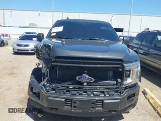 2020 Ford F-150 XL with VIN 1FTEW1E50LKE93170, listed as a IAAI auction lot 41918973 with 99,117 mi miles and . Bid and sale history available at carsss.com. Image 12.