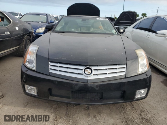 2005 Cadillac XLR z VIN 1G6YV34A955600425, wystawiony jako Copart lot #76188034 z przebiegiem Nie podano mil oraz Szkody całkowita. Historia ofert i sprzedaży dostępna na DreamBid. Obrazek 5.