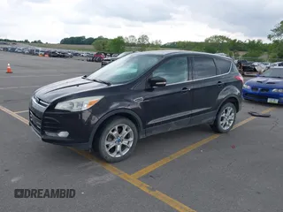 2013 Ford Escape SEL z VIN 1FMCU9H90DUC34965, wystawiony jako IAAI lot #42361165 z przebiegiem 177 387 mil mil oraz . Historia ofert i sprzedaży dostępna na DreamBid. Obrazek 2.