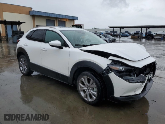 2021 Mazda CX-30 Premium with VIN 3MVDMADM4MM217643, listed as a Copart auction lot 45041145 with 27,774 mi miles and Salvage title. Bid and sale history available at DreamBid. Image 4.