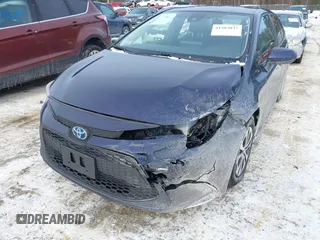 2022 Toyota Corolla Hybrid LE with VIN JTDEAMDEXNJ048722, listed as a IAAI auction lot 41383037 with 72,878 mi miles. Bid and sale history available at carsss.com. Image 6.