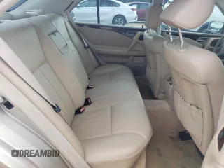 1999 Mercedes-Benz E-Class with VIN WDBJF65HXXA891437, listed as a Copart auction lot 73278334 with 197,159 mi miles and Salvage Title. Bid and sale history available at carsss.com. Image 10.