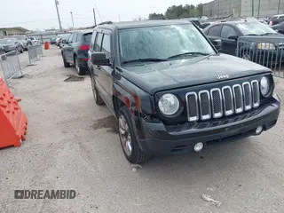2015 Jeep Patriot Sport with VIN 1C4NJPBB0FD144126, listed as a IAAI auction lot 41745818 with 148,116 mi miles. Bid and sale history available at carsss.com. Image 1.