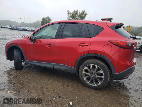 2016 Mazda CX-5 Grand Touring with VIN JM3KE4DY3G0713283, listed as a Copart auction lot 73346194 with 135,382 mi miles and Salvage Title. Bid and sale history available at carsss.com. Image 2.