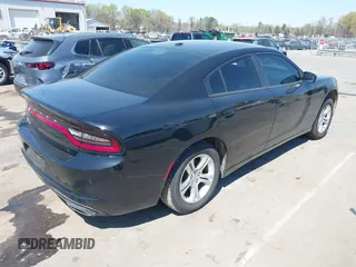 2019 Dodge Charger SXT with VIN 2C3CDXBG5KH713354, listed as a IAAI auction lot 41880772 with 133,408 mi miles. Bid and sale history available at carsss.com. Image 4.