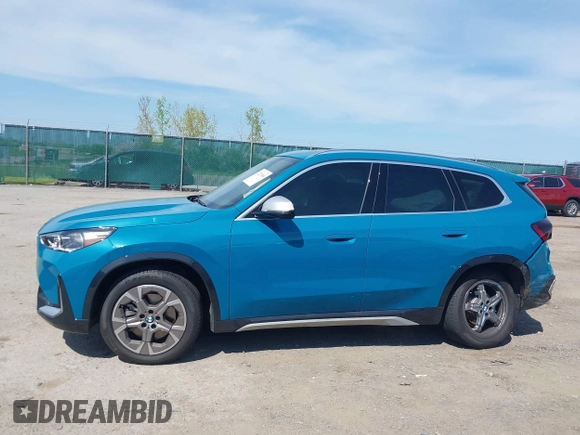 2023 BMW X1 xDrive28i with VIN WBX73EF00P5W52935, listed as a IAAI auction lot 42221084 with 16,394 mi miles and . Bid and sale history available at DreamBid. Image 14.