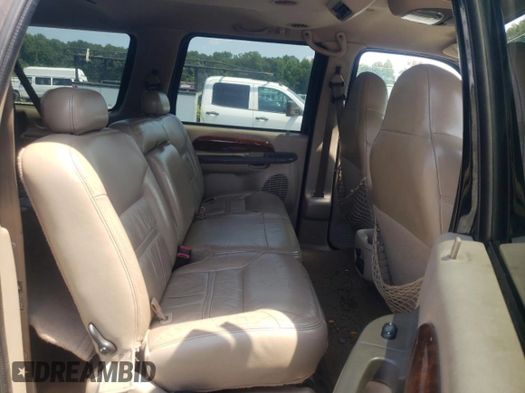 2000 Ford Excursion Limited with VIN 1FMNU42L1YEC61687, listed as a Copart auction lot 67590714 with 219,386 mi miles and Salvage title. Bid and sale history available at DreamBid. Image 10.