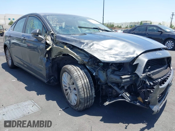 2015 Ford Fusion SE Hybrid with VIN 3FA6P0LU4FR305908, listed as a IAAI auction lot 42539627 with 91,467 mi miles and . Bid and sale history available at DreamBid. Image 1.