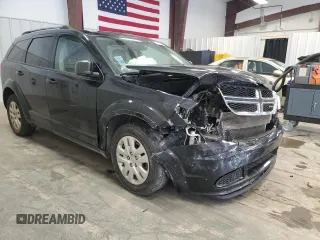 2017 Dodge Journey SE with VIN 3C4PDCAB4HT704902, listed as a Copart auction lot 51410815 with 153,976 mi miles and Salvage Title. Bid and sale history available at DreamBid. Image 4.