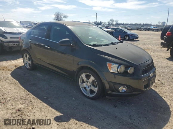 2014 Chevrolet Sonic LTZ with VIN 1G1JE5SB9E4103444, listed as a Copart auction lot 46949955 with 120,986 mi miles and Clean Title. Bid and sale history available at carsss.com. Image 4.