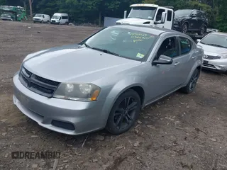 2014 Dodge Avenger SE with VIN 1C3CDZAB5EN149248, listed as a IAAI auction lot 42524423 with 120,974 mi miles and . Bid and sale history available at DreamBid. Image 2.