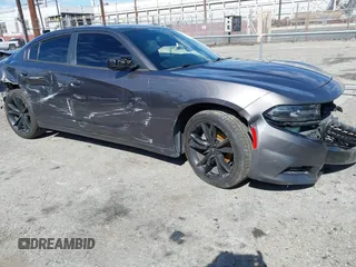 2018 Dodge Charger SXT Plus with VIN 2C3CDXHG0JH173370, listed as a IAAI auction lot 41625451 with 76,318 mi miles and . Bid and sale history available at carsss.com. Image 1.