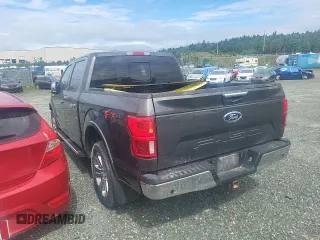 2020 Ford F-150 XL with VIN 1FTEW1E58LKF49324, listed as a Copart auction lot 58653615 with 118,520 mi miles and Salvage title. Bid and sale history available at DreamBid. Image 2.