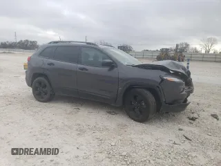 2016 Jeep Cherokee Altitude with VIN 1C4PJLAB6GW336563, listed as a Copart auction lot 47504435 with 152,479 mi miles and Salvage Title. Bid and sale history available at DreamBid. Image 4.