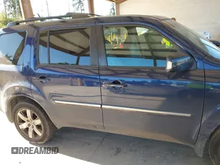 2013 Honda Pilot Touring with VIN 5FNYF4H95DB079782, listed as a IAAI auction lot 42737391 with 152,830 mi miles and . Bid and sale history available at DreamBid. Image 13.