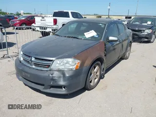 2013 Dodge Avenger SXT with VIN 1C3CDZCB8DN562180, listed as a IAAI auction lot 42000811 with 207,872 mi miles and . Bid and sale history available at carsss.com. Image 2.