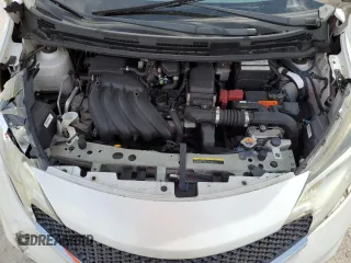 2015 Nissan Note SR z VIN 3N1CE2CP3FL399892, wystawiony jako Copart lot #72311024 z przebiegiem 80 234 mil mil oraz Szkoda całkowita • Salvage title. Historia ofert i sprzedaży dostępna na DreamBid. Obrazek 12.